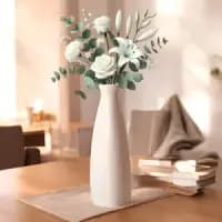 white ceramic flower vase